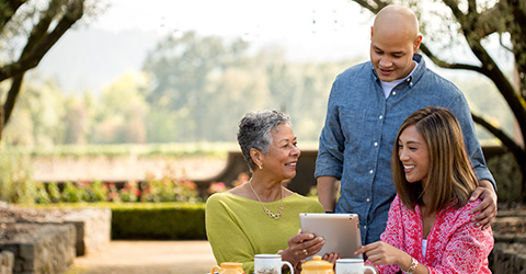 Photo of family consulting tablet device with overlay of five circle charts